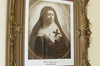 Carved golden frame. Sketch of Marie de st-Joseph de la Troche, in nun clothes, turned to the right, crossed hands on her heart, a cross in her left hand.