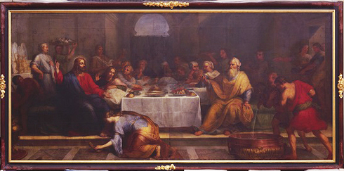 Horizontal painting, at table, Jesus, Simon and guests. In the foreground, a women is squatted. Indoor scene.