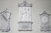 
Funerary plate with portrait and branch. Vertical, pointed top with cross.